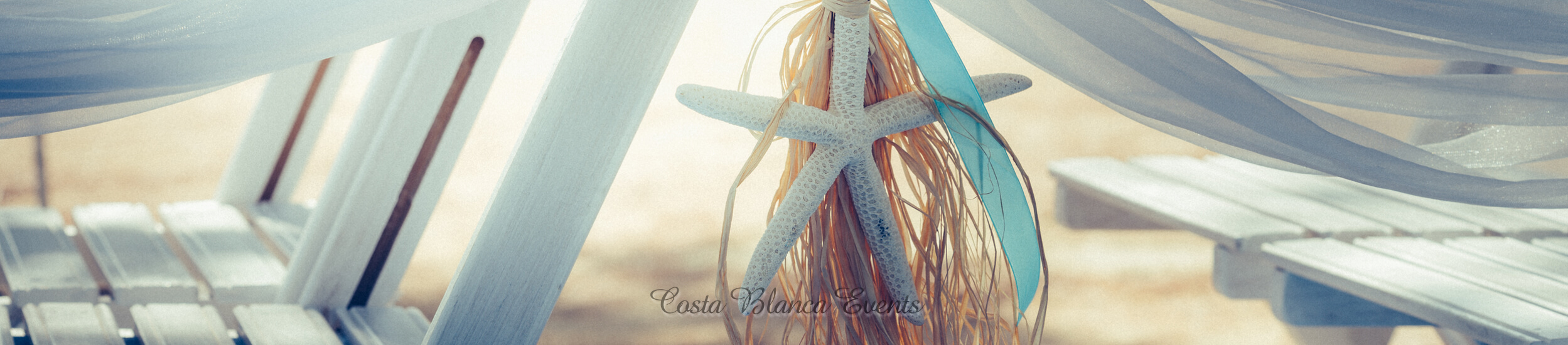 Detail of beach theme chair decoration with starfish